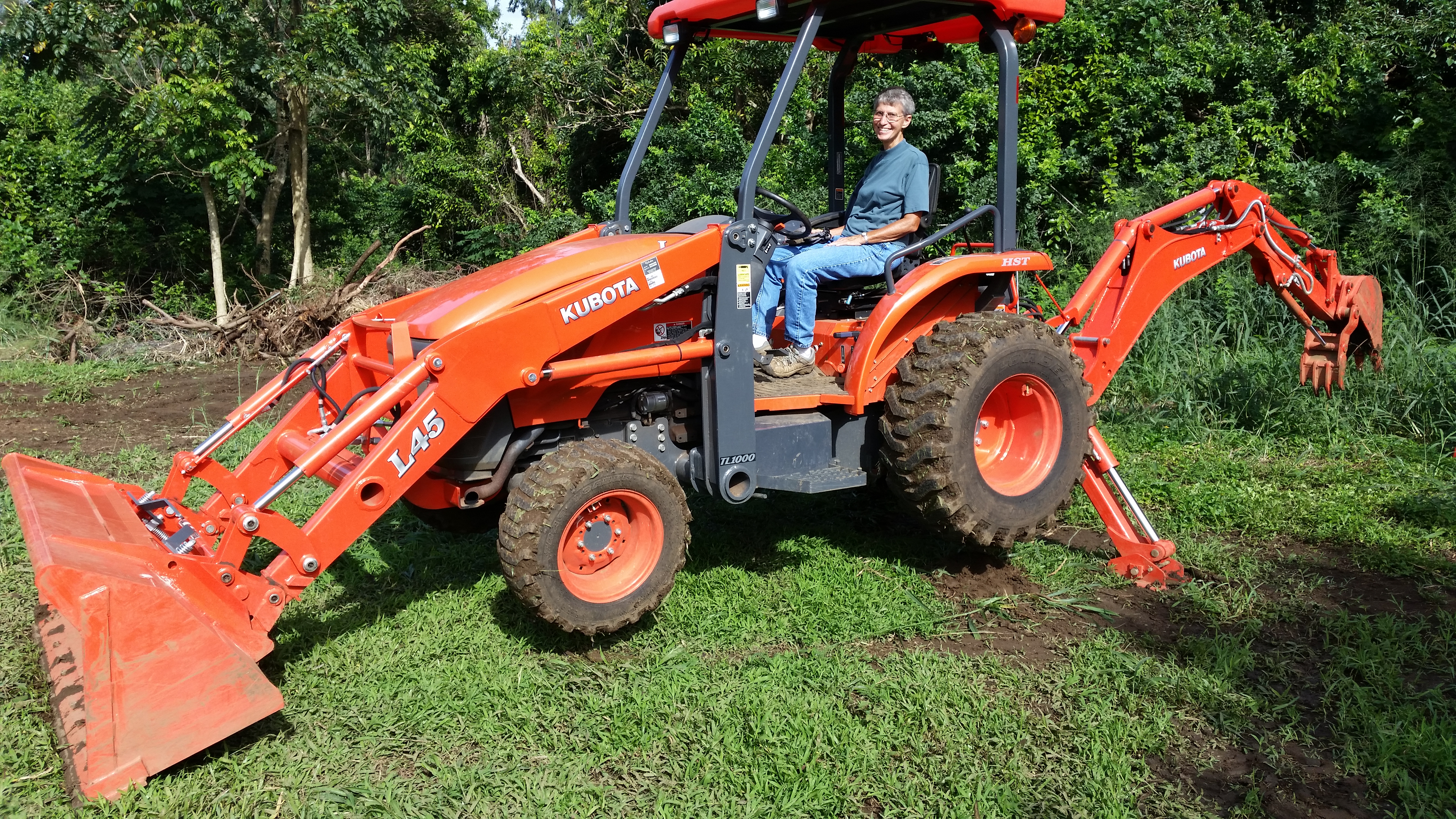 annie-on-backhoe.jpg